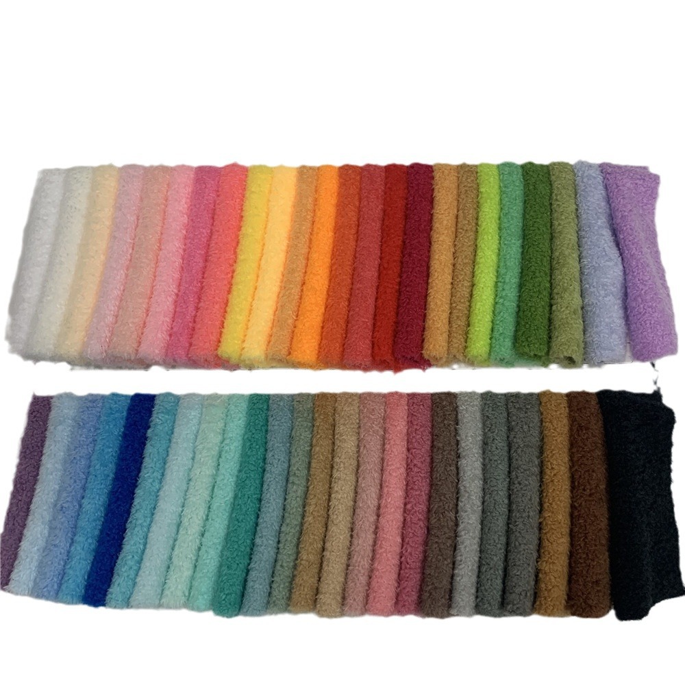 现货蚂蚁绒云朵绒雪花绒珍珠绒面料蜜桃绒毛绒家居服鞋材玩具箱包