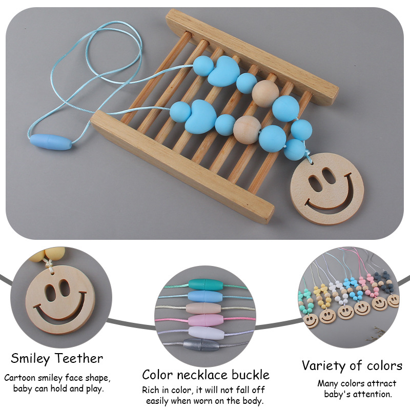 Nuevo bebé suministros smiley cara mordedor collar bebé cuentas de silicona mordida molar masticable colgante collar