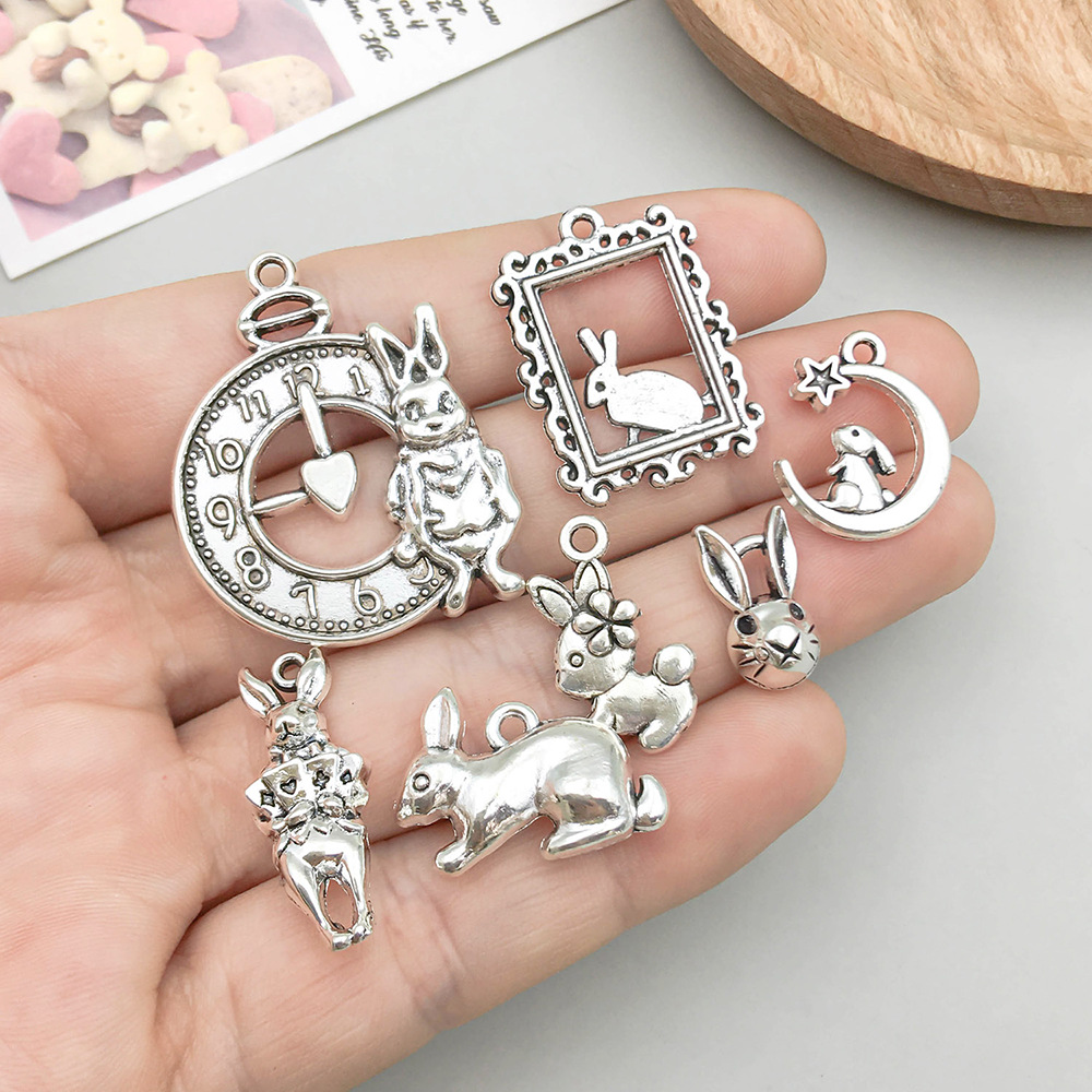 2g Weight Pendant Jewelry Making Type 17*24mm Jewelry Making Size DIY Jewelry Accessories Classification 11 Models, 2 Each, 22/Bag Quantity Zinc alloy Material Rabbit Pattern Polished Finish Plating Design Cute Style 11 Models, 2 Each, 22/Bag 17*24mm Zinc Alloy Rabbit Polished Pendant 3
