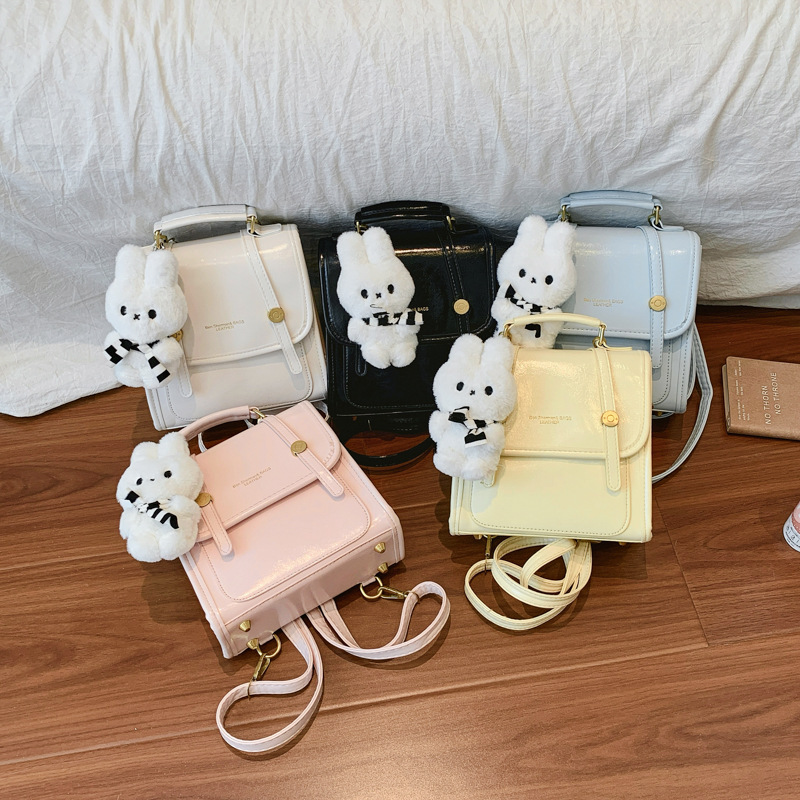 Cantos colgantes de dibujos animados de hombro pequeño bolso de mujer de verano estilo coreano nicho color sólido mochila mujer