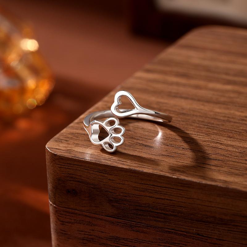 TEMU transfronterizo Amazon 925 plata esterlina hueco garra de gato impresa huella de perro anillo de dedos de cola abierto anillo de articulación femenina