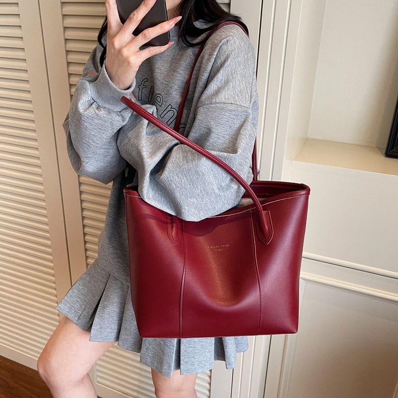 Bolso Tote nuevo producto más vendido transfronterizo para mujer de gran capacidad 2025 todo-fósforo casual simple de alta calidad bolsa de axila de un solo hombro