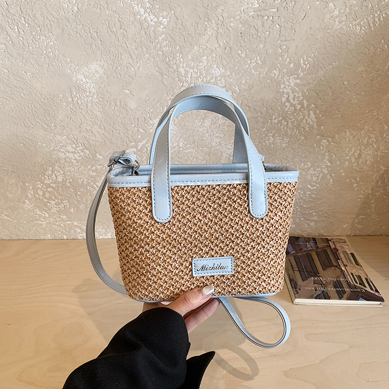 Bolsa de playa de moda coreana tejida, color extranjero, bolsa de hombro ligera y compacta para niños y niñas, nueva bolsa infantil transfronteriza.