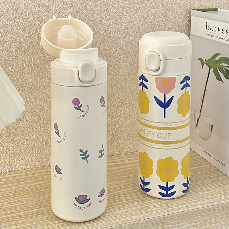 Suministro directo de fábrica taza de vacío en stock al por mayor de dibujos animados lindo flor tulipán con hebilla con paja taza de vacío