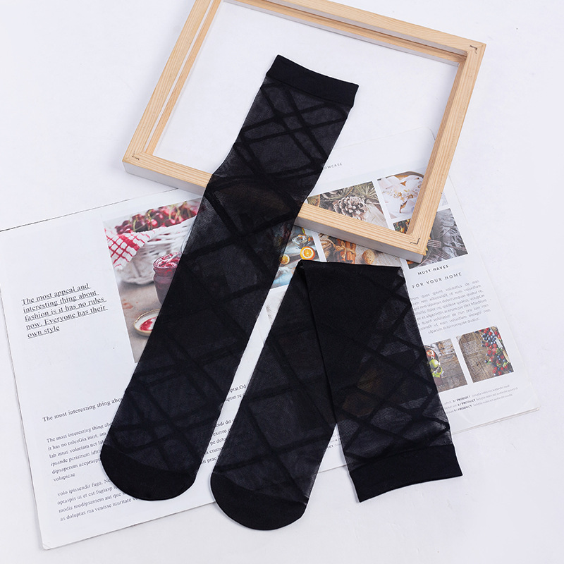 Calcetines de mujer JK estilo adulto calcetines de becerro ins diamante Cruz color sólido blanco y negro transparente medias altas medias al por mayor