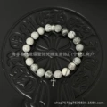 Map stone-four beads cross