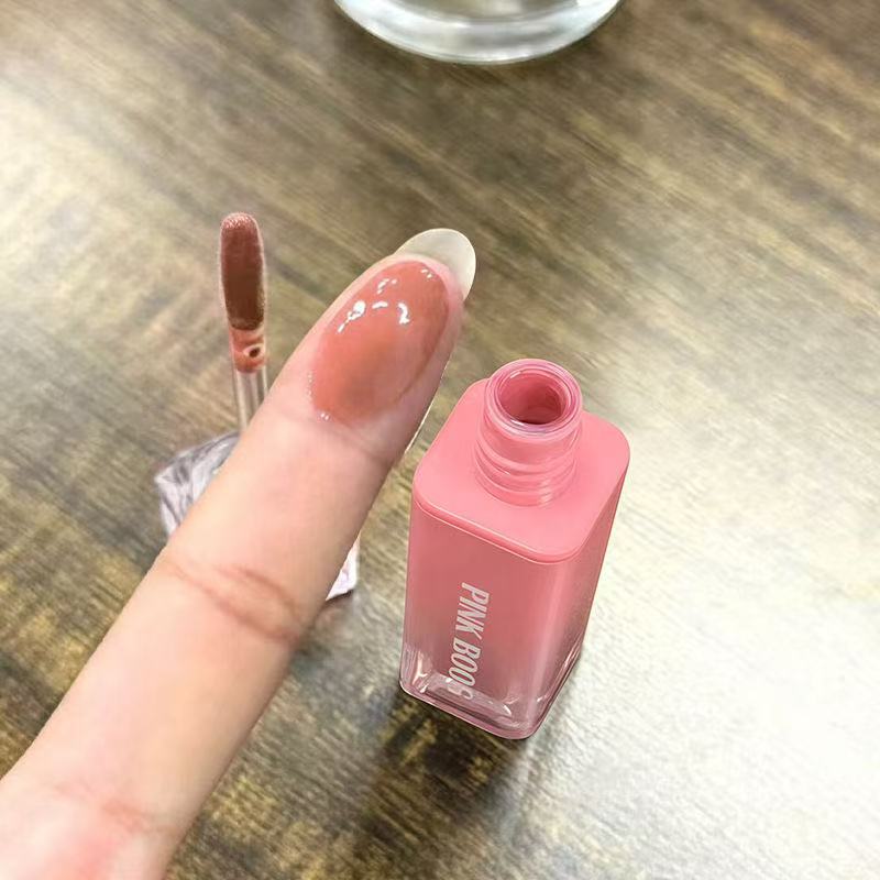 大きな目の円の輪 ~ 氷山は固体の水の光の唇の蜜を保護してすっぴんの学生の党の口紅の精華の唇の釉薬の蜜を潤します。|undefined