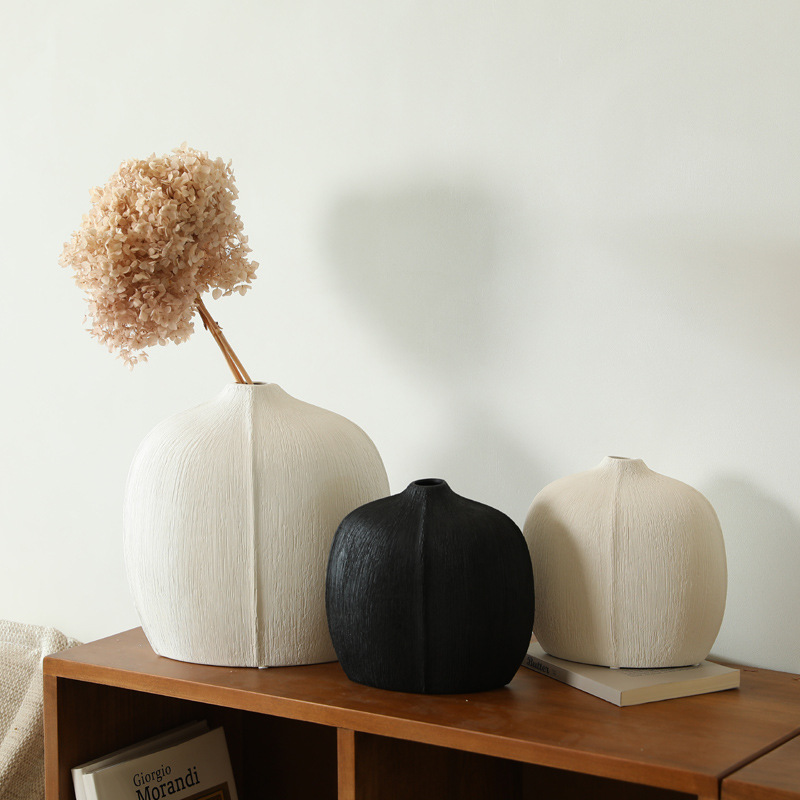 El viento silencioso de la cerámica negra estampada ornamentos de vasijas de flores de la sala de estar armario de televisión entrada flor seca decoración creativa