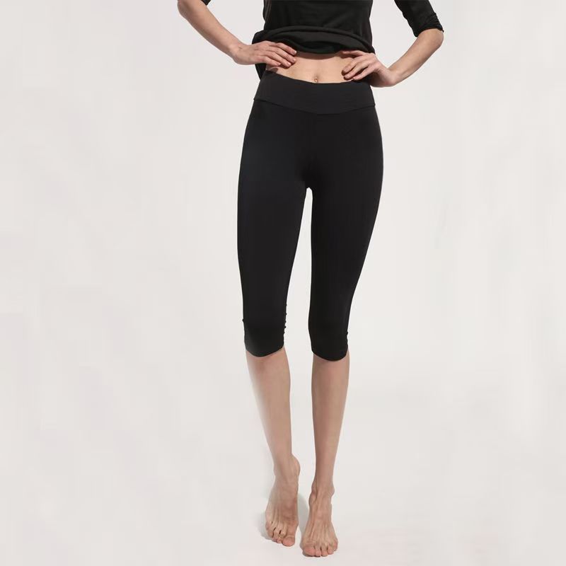 Primavera y verano yoga siete pantalones de malla de mujer empalmado hueco cintura alta pantalones deportivos para correr pantalones de ejercicio pantalones de bicicleta