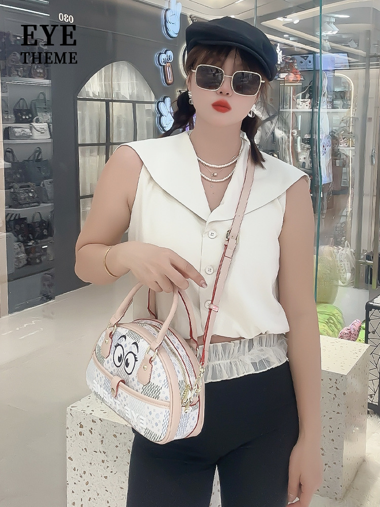 Caricatura extraña bolsa semiridonda impresa de contraste almohada bolsa de tramo inclinada bolsa de personalidad práctica 2682 #