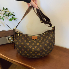 2025新型女性バッグ老花衝突色大容量餃子ファッション復古百合脇下シングル肩斜め掛け三日月バッグ