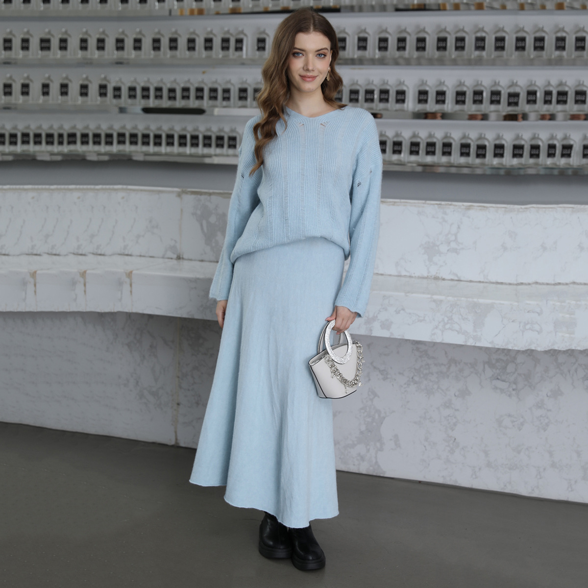 Solid color base knitted sweater with a round collar