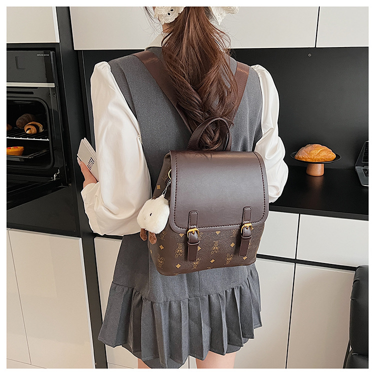 This is a niche design for women, featuring cartoon animal prints. It is a pink backpack with a high level of appearance and large capacity for travel undefined