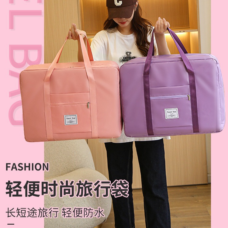 Venta al por mayor bolsa de viaje de celebridad de Internet bolsa de viaje ligero de las mujeres bolsa de equipaje de embarque de almacenamiento de corta distancia bolsa de maternidad de gran capacidad para hombres