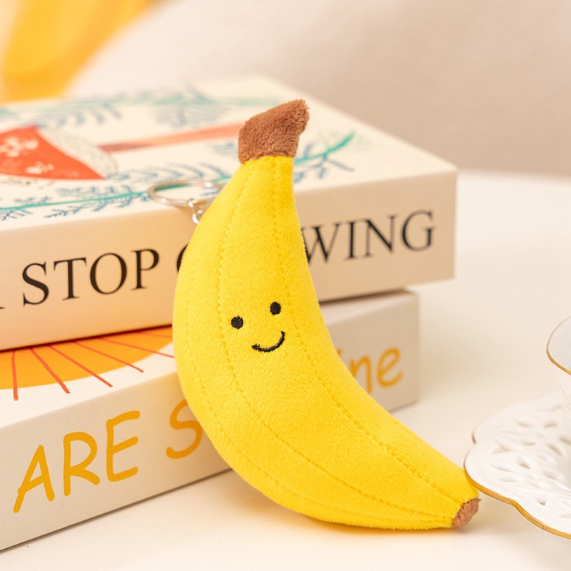 Fruitas interesantes melocotones bananas granada fruta de fuego juguetes de peluche bolsas de muñecas colgantes cereza muñeca agarrar muñeca máquina