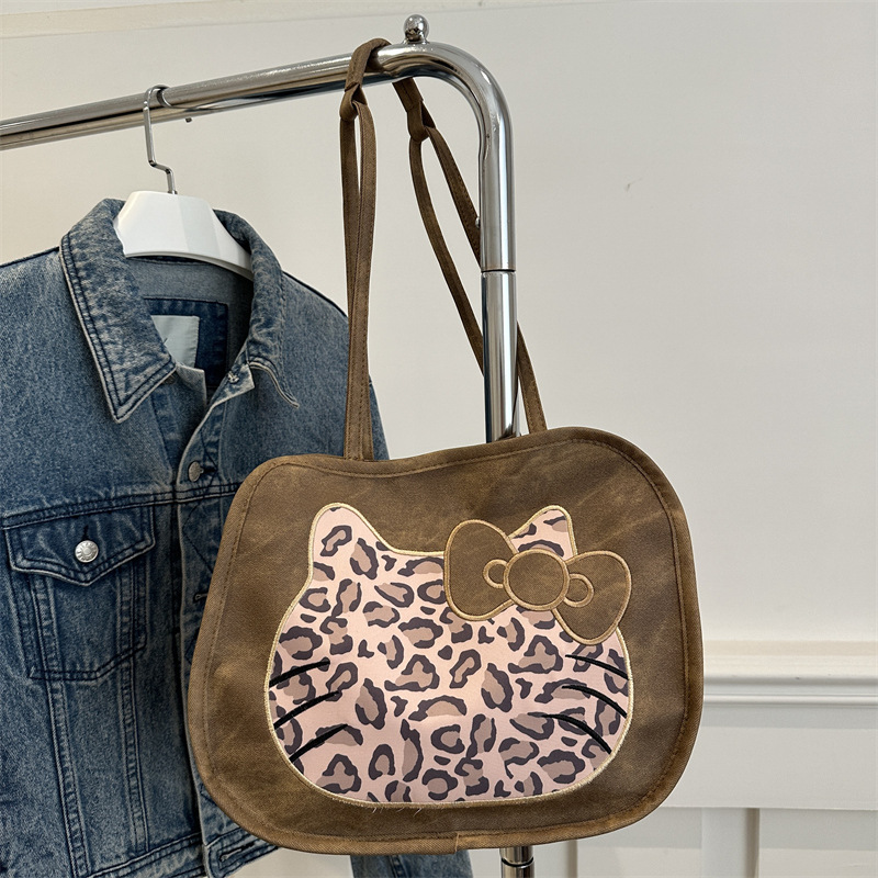 Honey Kitty Leopard empalme imitación jeans colorido simple multifuncional gran capacidad de un hombro mochila 2024 bolso de mujer