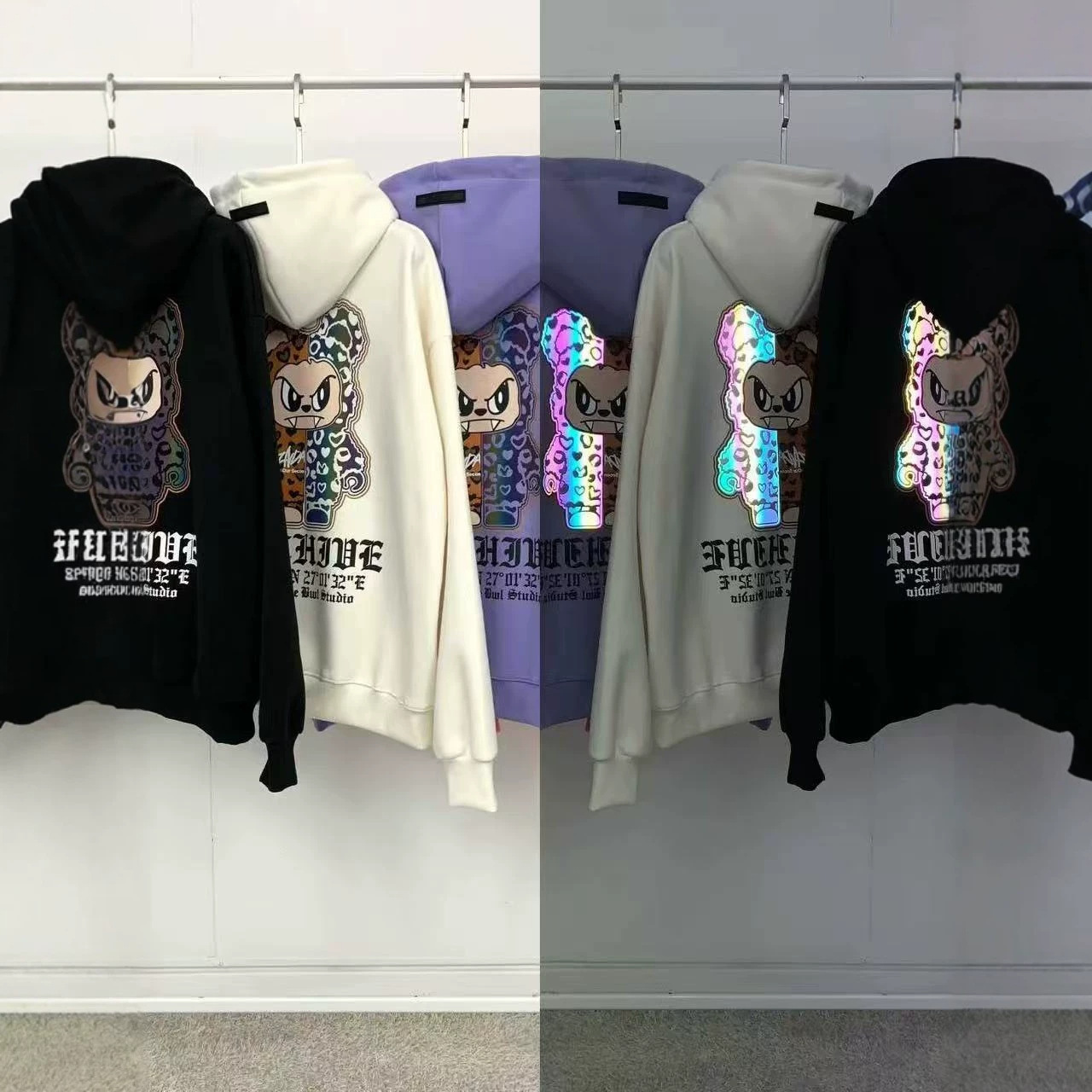 Korean Dongdaemun shopping service for couples' clothing: early autumn sweatshirts for men and women, loose oversized pullovers with 3M reflective cartoon designs