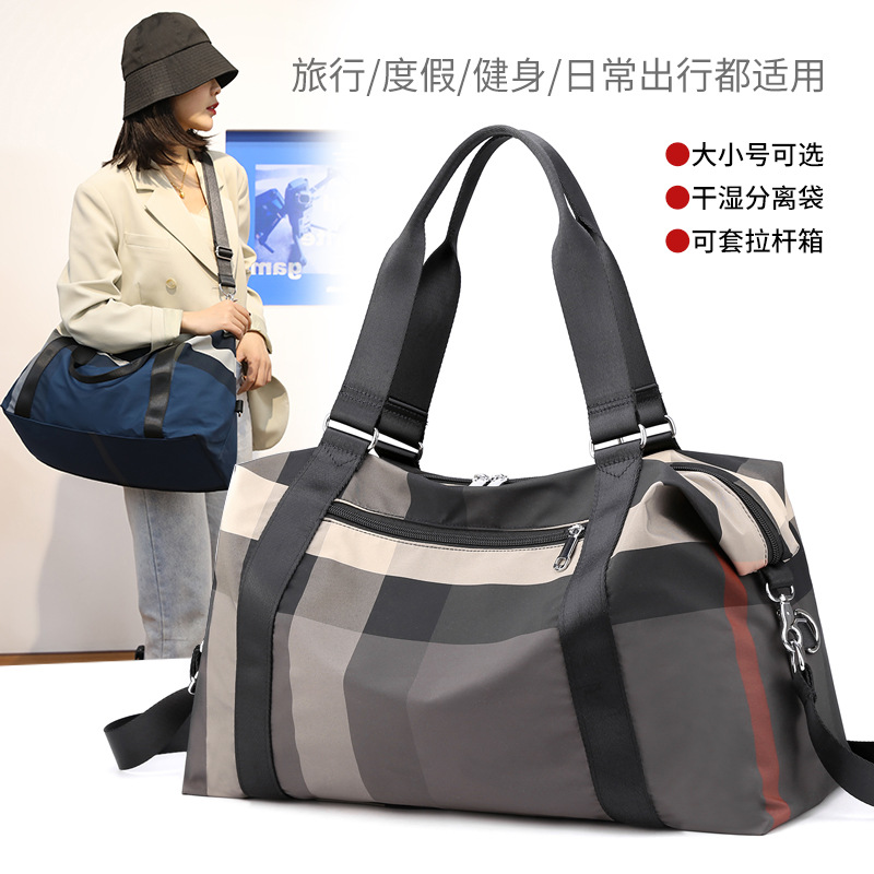 手提包女2021新款短途旅遊行李包韓版男大容量出差幹濕分離健身包