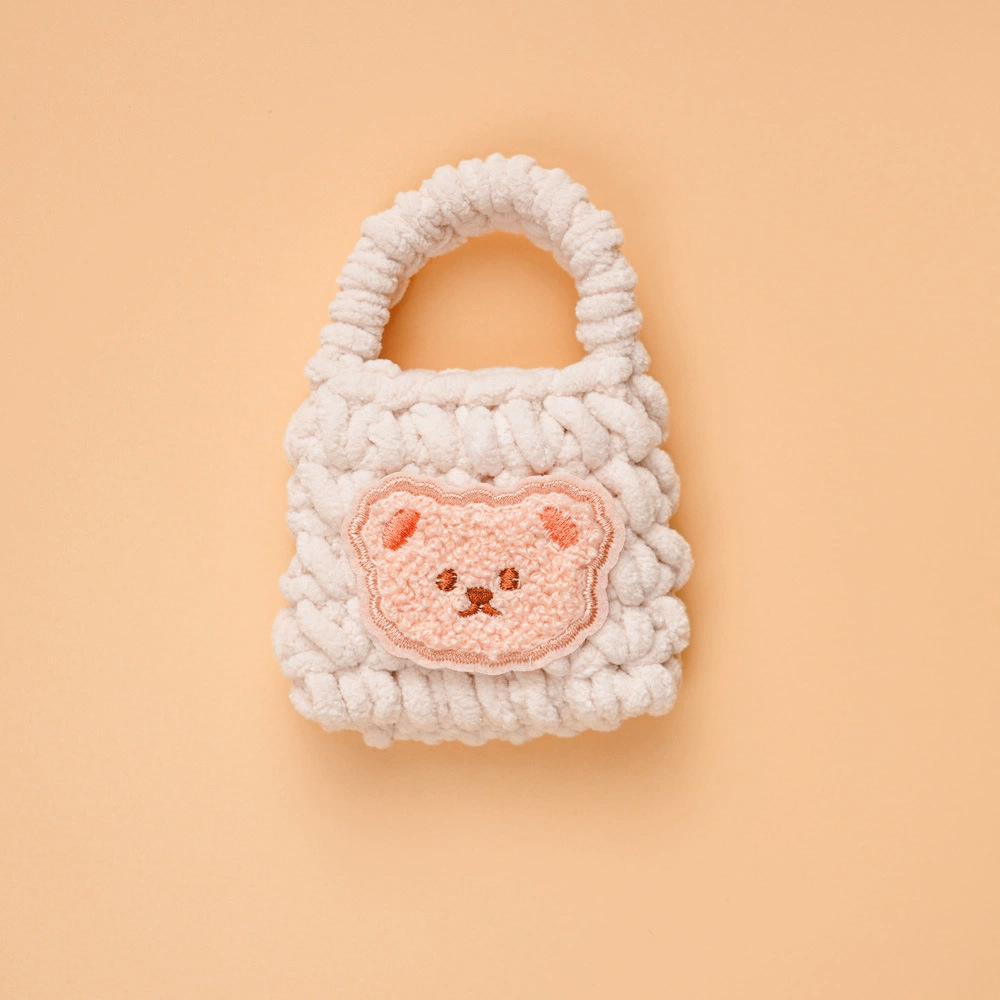 Bolsa de auriculares ganchillo acabado con cubierta protectora bluetooth peluche lindo oso pequeño tejido a mano bolsa de cambio de llavero