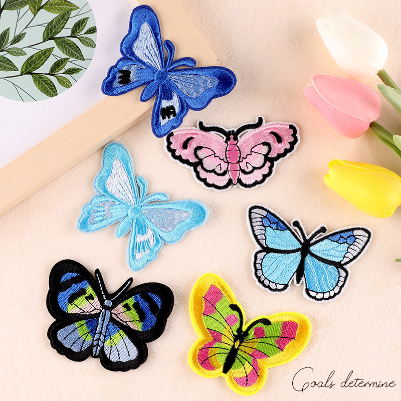 Miles de tiendas de bordado de computadora, aditivos de ropa, mariposas de animales, parches DIY, emblemas bordadas, pegatinas de tela.