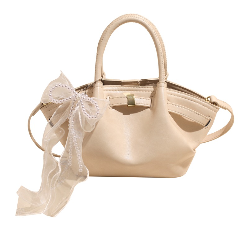 Nicho Zhong bolso de pulsera de brazalete para mujeres 2025, nuevo tipo de mochila de viaje, diseño de tendencia, bolso de cubo de alta calidad