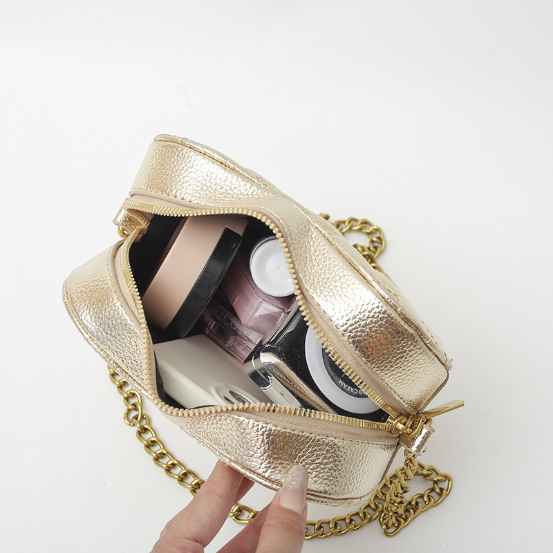 Bolso de hombro transfronterizo para mujer nueva tendencia bolso de corazón de alta gama patrón de lichi ringge bolso de mensajero de cadena de color sólido simple