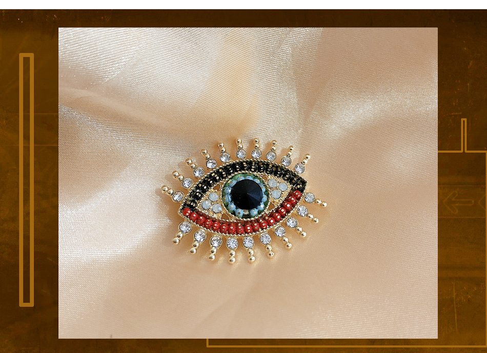 Retro Devil's Eye Alloy Pearl Inlay Artificial Gemstones Unisex Brooches display picture 5