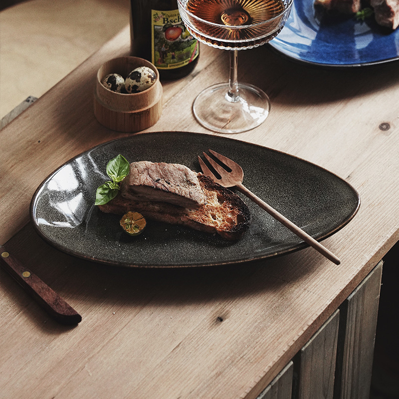 Horno de estilo japonés plato de pescado elíptico irregular de cerámica vajilla de restaurante especial plato de filete plato de sushi plato de restaurante occidental transfronterizo