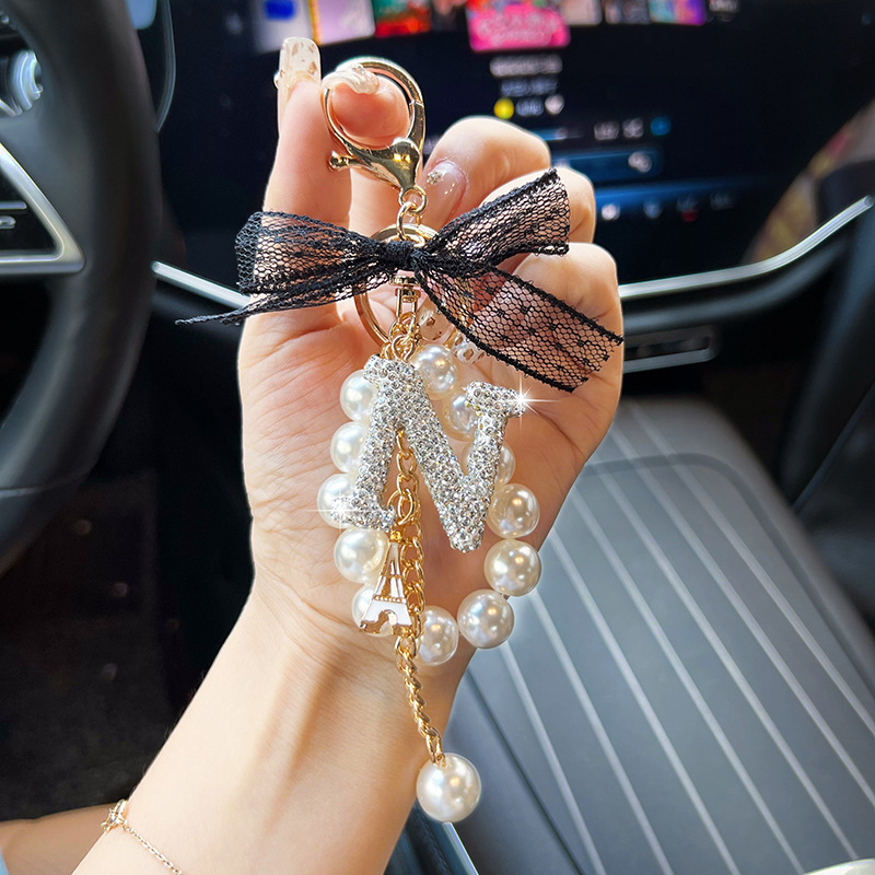 Arco de encaje de cerámica de arcilla letras llavero de perlas creativo colgante de llaves de automóvil de diamante completo colgante de bolsa