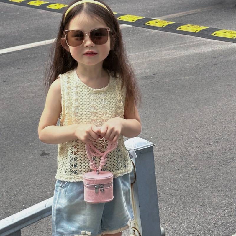 Bolso de hombro para niña coreana simple color sólido mini lindo bolso de cubo para bebé 2025 nuevo bolso de auriculares para niños marea