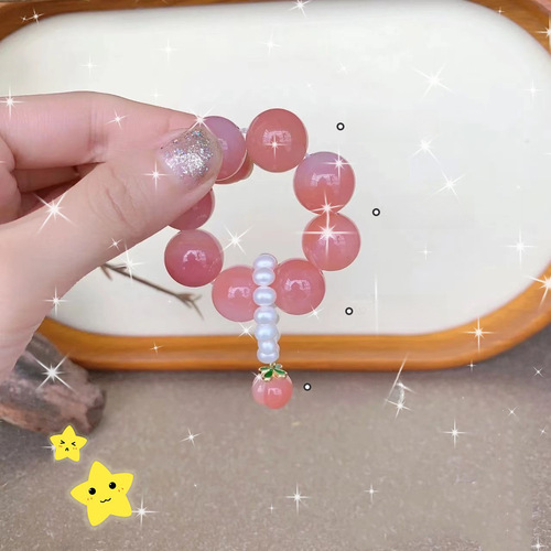 Xiaohongshu style finger loop bracelet, student version pink crystal peach-shaped beads, handheld bead chain, wholesale