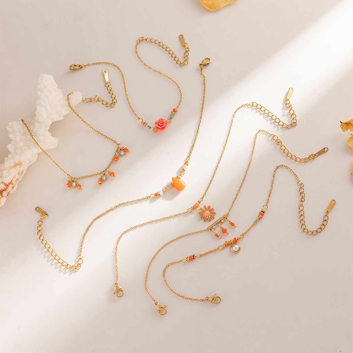 Tena Europa y América naranja con cuentas pulsera de cadena de acero inoxidable apilada y chapada en oro de 18 quilates simple joyería de mano ins para mujer
