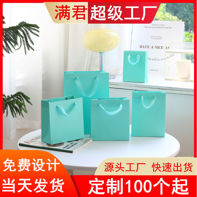 Clothing Store Handbag Blue Shopping Paper Bag Wholesale Packaging Bag White Cardboard Gift Bag Souvenir Bag Customization