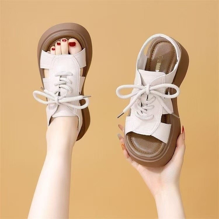 Sandalias de fondo de muffin romano para mujeres en verano de 2026 nuevas sandalias de alta altura de fondo de pescado dulce y fresco