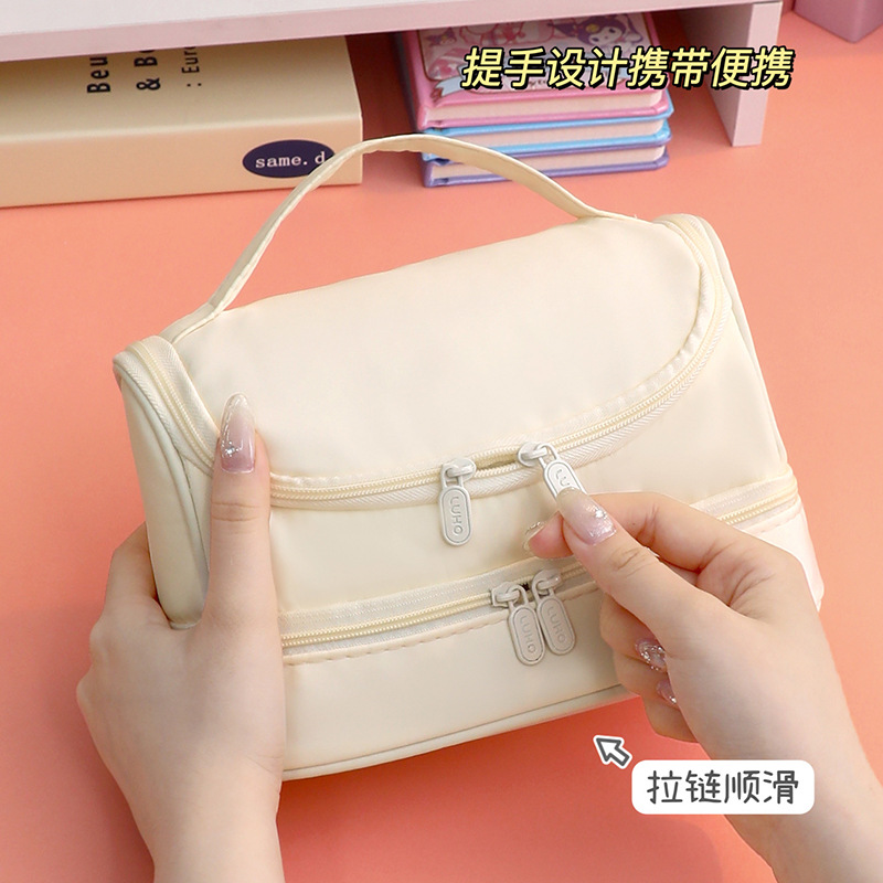 Bolsa de bolígrafo de gran capacidad, memoria portátil al por mayor, lona impermeable, caja de bolígrafo de macarón de color sólido, bolsa de maquillaje simple