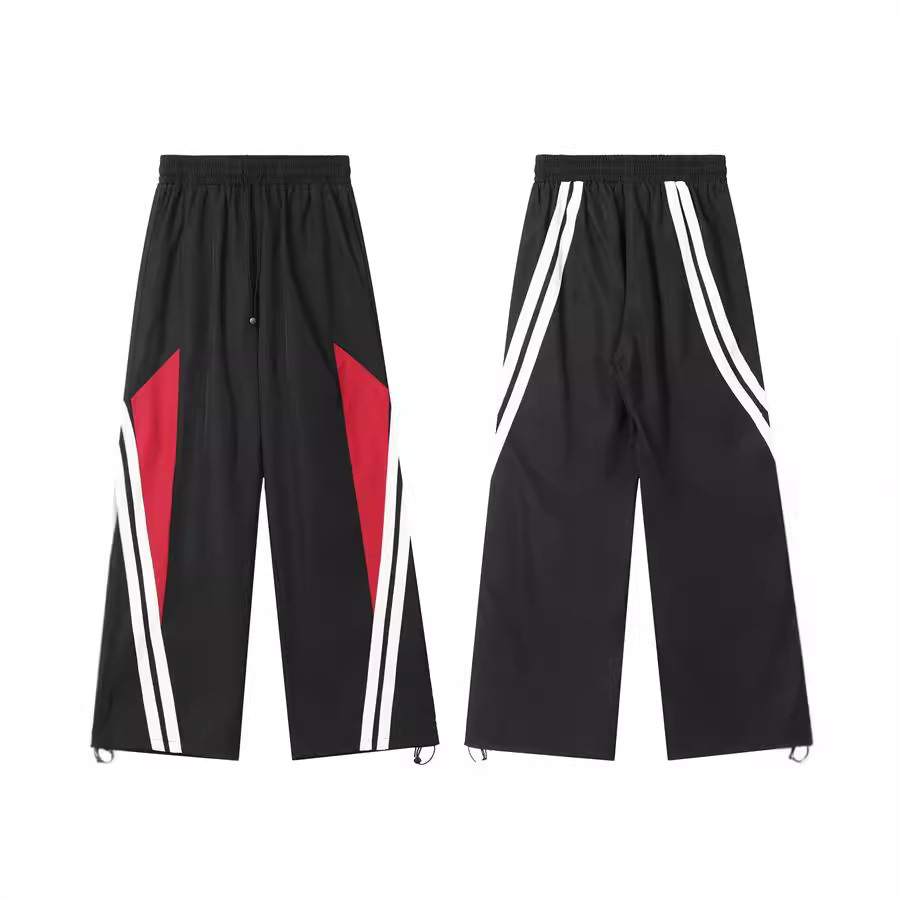 Pantalones deportivos a juego con rayas laterales de baile callejero retro americano para hombres y mujeres pantalones anchos sueltos rectos de primavera y otoño