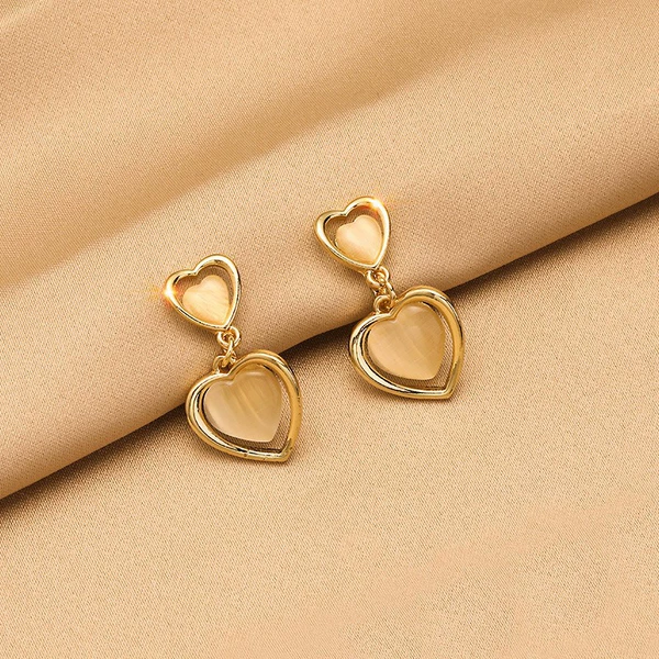 Earrings, ear clips, cat's eye