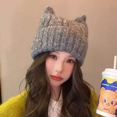 秋冬帽子の子供は甘くて小さい悪魔のかわいい耳の毛糸の帽子の防寒耳の保温のニットの帽子は冷たい帽子に乗ります。