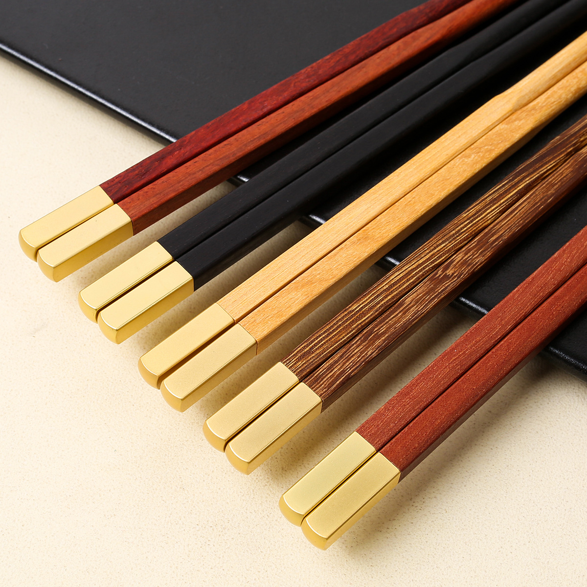 Nuevo hogar palillos de madera maciza caja de regalo cabeza de metal alas de pollo Rosewood nacional moda hogar banquete palillos empresa traje de regalo