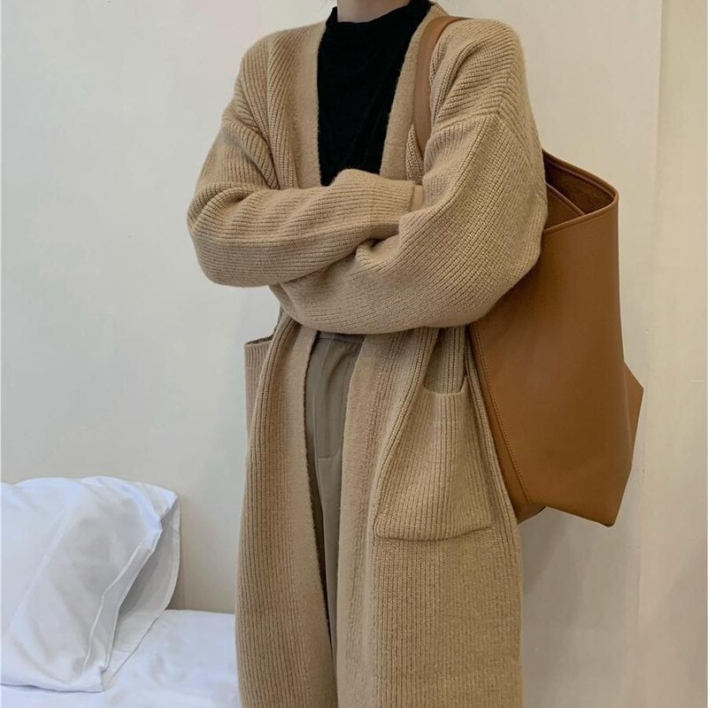 Autumn and winter Korean-style loose-fitting long coat, sweater, and outerwear for women, with a sophisticated look, pockets, and a soft, comfortable feel, perfect as an outer layer or cardigan Autumn and winter Korean-style loose-fitting long coat, sweater, and outerwear for women, with a sophisticated look, pockets, and a soft, comfortable feel, perfect as an outer layer or cardigan