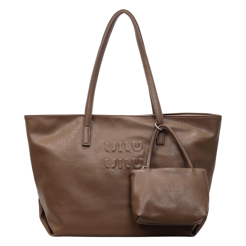 Bolso coreano nicho Zhong tote simple nuevo ocio de gran capacidad alta sensación práctica hombro axilar bolsa de viaje