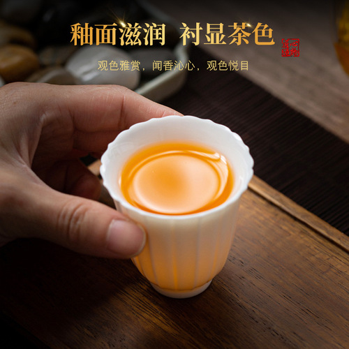 Suet-fat jade white porcelain hand-carved petal master cup ceramic thin body tea cup high-looking household kung fu tea cup