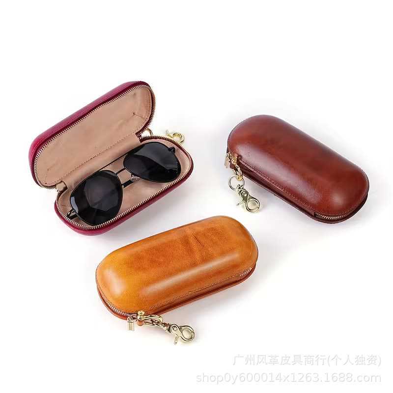 Top-layer cowhide zipper hard shell genuine leather eyeglass case with hanging buckle, anti-pressure portable sunglasses storage and protection case Top-layer cowhide zipper hard shell genuine leather eyeglass case with hanging buckle, anti-pressure portable sunglasses storage and protection case