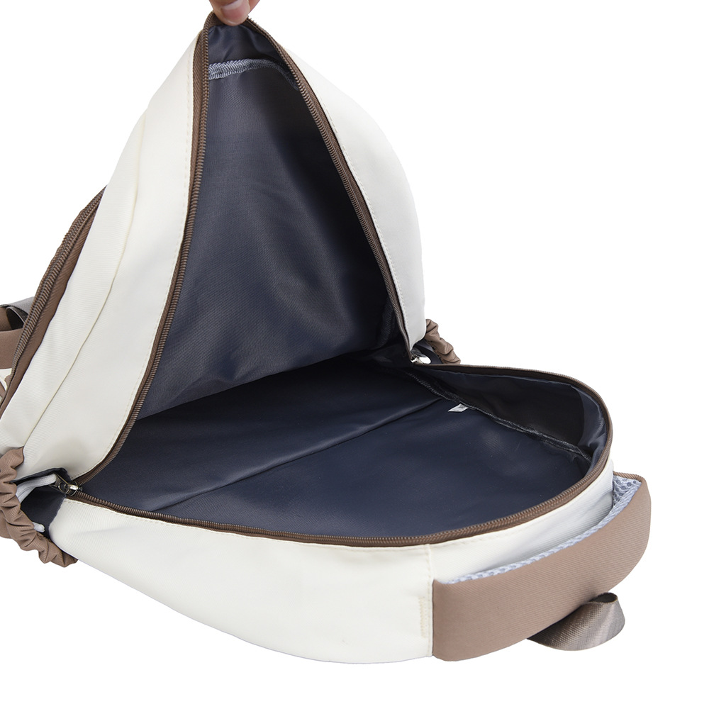 Nueva tendencia de la moda color de contraste mochila de gran capacidad impermeable para estudiantes universitarios de secundaria y preparatoria mochila de viaje ligera al por mayor