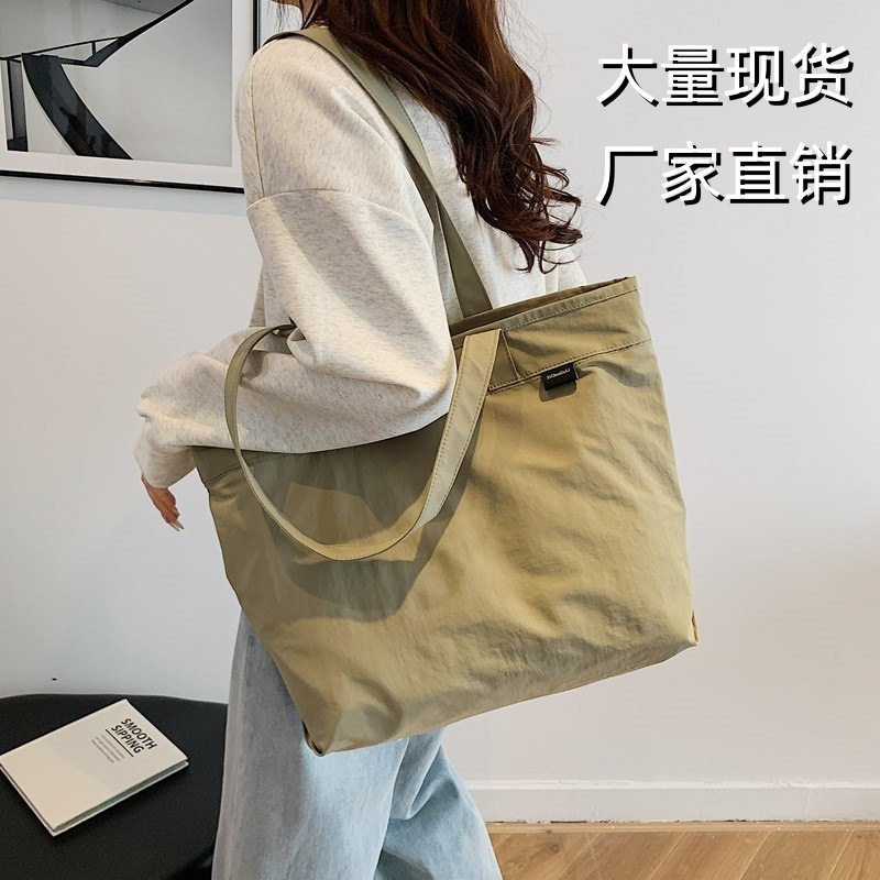 日本系キャンバスバッグ女性シングルショルダー学生純色大容量授業通勤トートレジャーバッグ斜め掛け|undefined