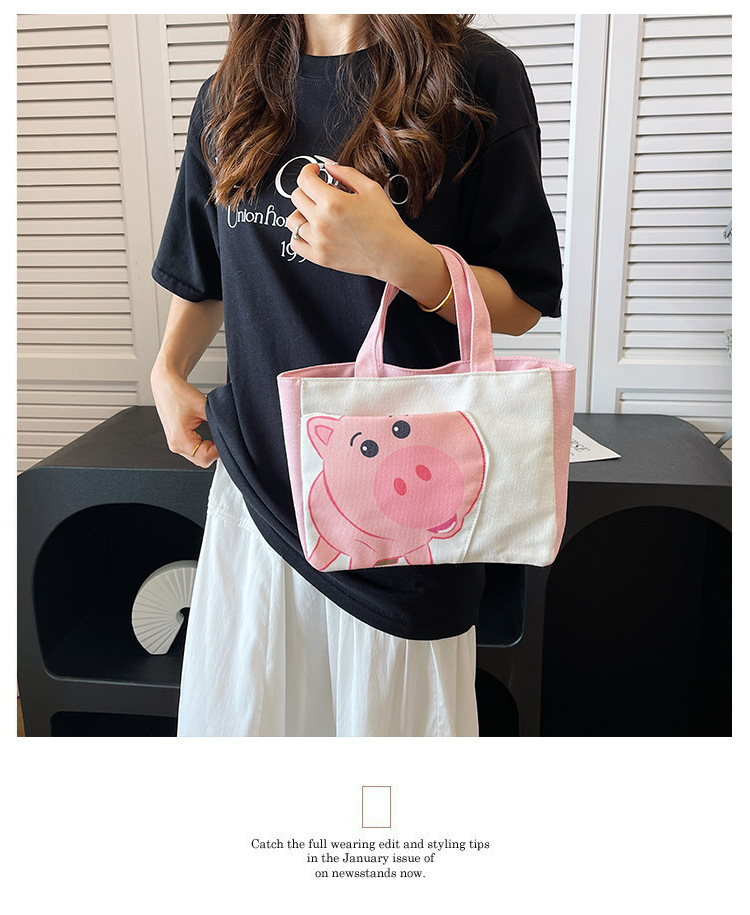 Cute cartoon printed small bag, 2024 summer new style hand-held piggy girl handbag, student storage canvas bag undefined