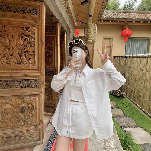 2026 spring and summer lazy loose long-sleeved solid color sun-proof shirt short skirt two-piece fashionable temperament lazy suit