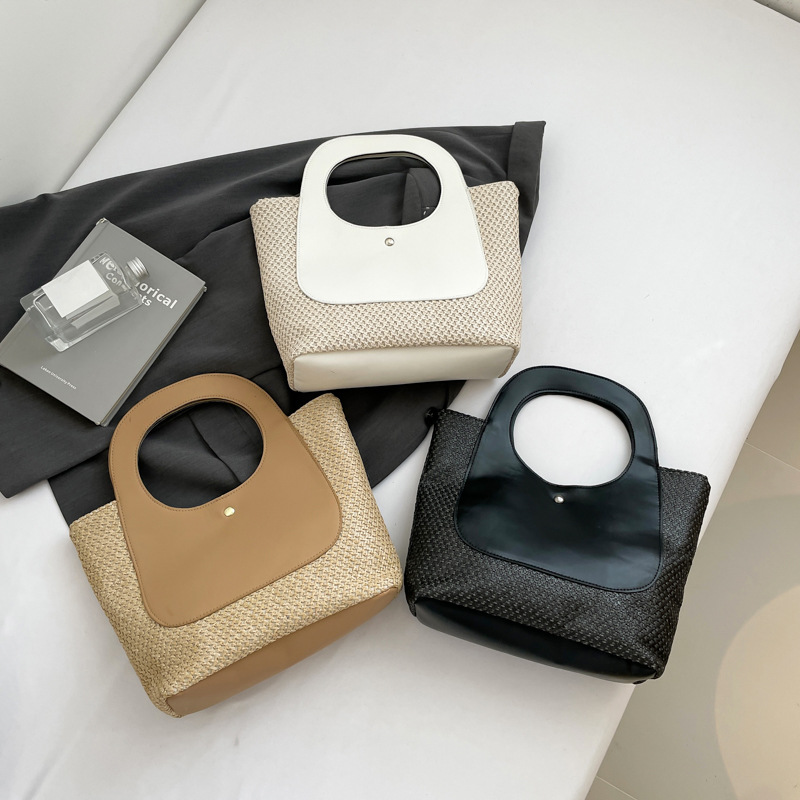 Bolsa de paja de empalme retro 2026 nueva bolsa de moda femenina minimalista de gran capacidad bolsa de tejido de arte de marea