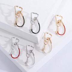 Fashionable, creative and personalized doctor stethoscope brooch, simple and natural clothing accessories, cardigan jacket, anti-exposure corsage