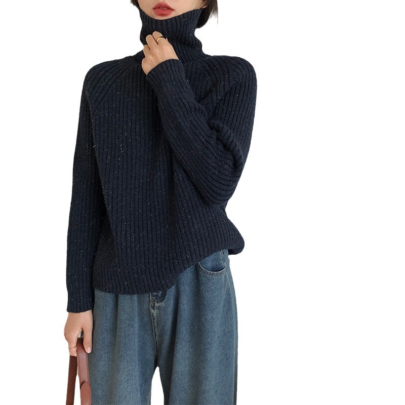 Viento perezoso cuello alto agujero delgado suéter de seda brillante diseño de color sólido delgado camiseta de punto de fondo de invierno de otoño chaqueta